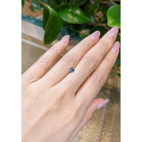 0.40 Ct. Greenish Blue Sapphire from Madagascar Life Style