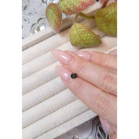 0.50 Ct. Bluish Green Sapphire from Madagascar Life Style