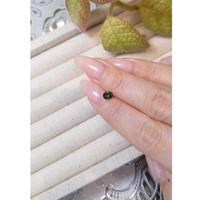 0.50 Ct. Bluish Green Sapphire from Madagascar Life Style