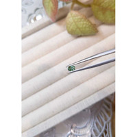 0.46 Ct. Bluish Green Sapphire from Madagascar Life Style