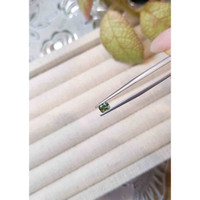 0.51 Ct. Yellowish Green Sapphire from Madagascar Life Style