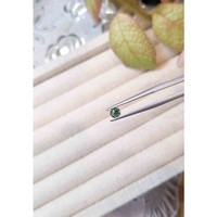 0.33 Ct. Bluish Green Sapphire from Madagascar Life Style