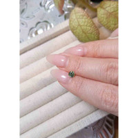 0.54 Ct. Yellowish Green Sapphire from Madagascar Life Style