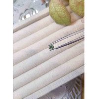 0.41 Ct. Yellowish Green Sapphire from Madagascar Life Style