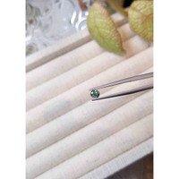 0.42 Ct. Bluish Green Sapphire from Madagascar Life Style