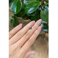 1.14 Ct. Yellowish Green Sapphire from Madagascar Life Style