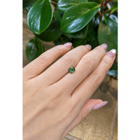 1.14 Ct. Yellowish Green Sapphire from Madagascar Life Style