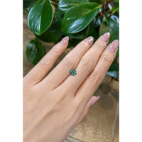 1.23 Ct. Yellowish Green Sapphire from Madagascar Life Style