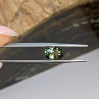 2.34 Ct. Yellowish Green Sapphire from Ceylon (Sri Lanka) Life Style