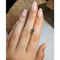 2.34 Ct. Yellowish Green Sapphire from Ceylon (Sri Lanka) Life Style