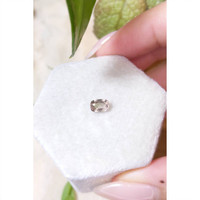 0.83 Ct. Peach Sapphire from Madagascar Life Style