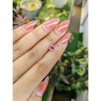 0.82 Ct. Pinkish Purple Sapphire from Madagascar Life Style