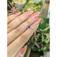 0.93 Ct. Pinkish Purple Sapphire from Madagascar Life Style