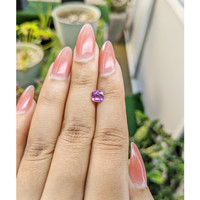 0.95 Ct. Pinkish Purple Sapphire from Madagascar Life Style