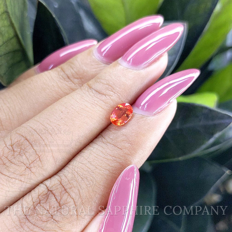 0.82 Ct. Reddish Orange Sapphire from Ceylon (Sri Lanka)