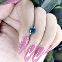 1.57 Ct. Greenish Blue Sapphire from Madagascar Life Style