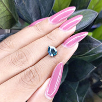 1.69 Ct. Bluish Green Sapphire from Madagascar Life Style