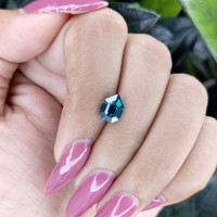 1.69 Ct. Bluish Green Sapphire from Madagascar Life Style