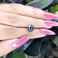 1.69 Ct. Bluish Green Sapphire from Madagascar Life Style