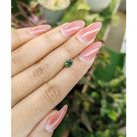 0.72 Ct. Green Sapphire from Madagascar Life Style