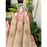 0.63 Ct. Bluish Green Sapphire from Madagascar Life Style