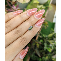 0.85 Ct. Yellowish Green Sapphire from Madagascar Life Style