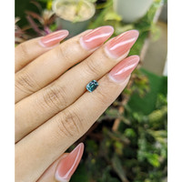 0.95 Ct. Bluish Green Sapphire from Madagascar Life Style