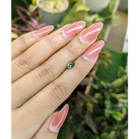 0.80 Ct. Green Sapphire from Madagascar Life Style