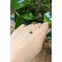 0.62 Ct. Bluish Green Sapphire from Madagascar Life Style