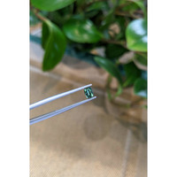 0.62 Ct. Bluish Green Sapphire from Madagascar Life Style