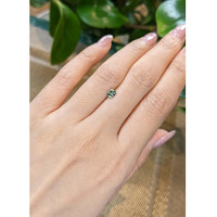 0.52 Ct. Bluish Green Sapphire from Madagascar Life Style