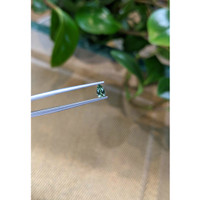 0.35 Ct. Green Sapphire from Madagascar Life Style