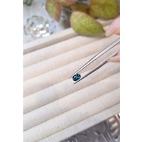 0.59 Ct. Bluish Green Sapphire from Madagascar Life Style