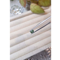 0.59 Ct. Green Sapphire from Madagascar Life Style