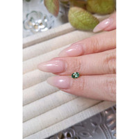 0.59 Ct. Green Sapphire from Madagascar Life Style