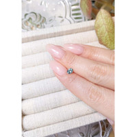 0.59 Ct. Greenish Blue Sapphire from Madagascar Life Style