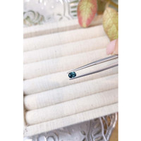 0.53 Ct. Greenish Blue Sapphire from Madagascar Life Style