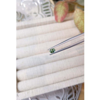 0.56 Ct. Bluish Green Sapphire from Madagascar Life Style