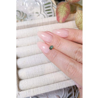 0.42 Ct. Bluish Green Sapphire from Madagascar Life Style