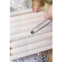 0.42 Ct. Bluish Green Sapphire from Madagascar Life Style