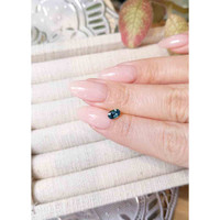 0.67 Ct. Greenish Blue Sapphire from Madagascar Life Style