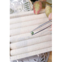 0.33 Ct. Bluish Green Sapphire from Madagascar Life Style