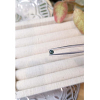 0.38 Ct. Greenish Blue Sapphire from Madagascar Life Style