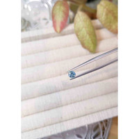 0.49 Ct. Greyish Blue Sapphire from Madagascar Life Style