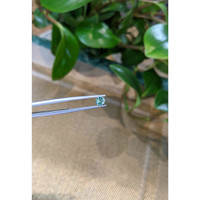 0.54 Ct. Bluish Green Sapphire from Madagascar Life Style