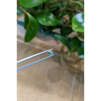 0.65 Ct. Greenish Blue Sapphire from Madagascar Life Style
