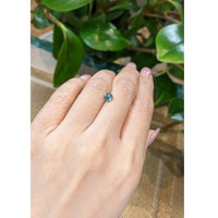 0.77 Ct. Bluish Green Sapphire from Madagascar Life Style