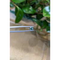 0.77 Ct. Bluish Green Sapphire from Madagascar Life Style