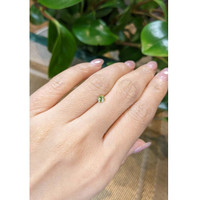 0.37 Ct. Greenish Yellow Sapphire from Madagascar Life Style