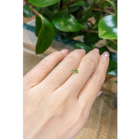 0.69 Ct. Yellowish Green Sapphire from Madagascar Life Style